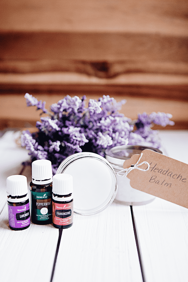 This DIY Headache Balm made with Frankincense, peppermint, and Lavender essential oils works wonders! Get rid of headaches and tension the natural way!