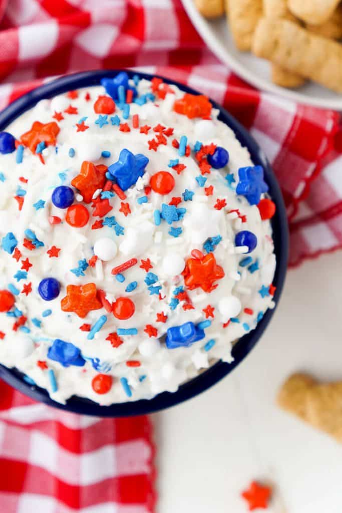 This Cake Batter Dip is made with just 4 ingredients and is ready in just 5 minutes! Change the sprinkles colors to customize it for any occasion!