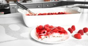 The perfect blend of sweet & tart, this raspberry pretzel salad is the perfect dessert.