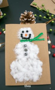 Give this holiday a personal touch by creating these easy and affordable DIY Cotton Ball Snowman Christmas cards!
