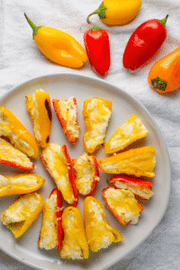Spicy food isn't for everyone, which makes these stuffed sweet peppers the ultimate party snack. Perfect for the Super Bowl!