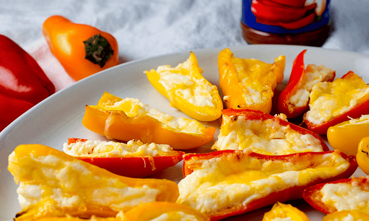 Spicy food isn't for everyone, which makes these stuffed sweet peppers the ultimate party snack. Perfect for the Super Bowl!