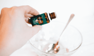 This DIY Headache Balm made with Frankincense, peppermint, and Lavender essential oils works wonders! Get rid of headaches and tension the natural way!